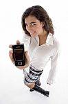 High Angle View Of Young Woman Showing Cell Phone Stock Photo