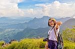 Hiker Girl With Happy On Phu Chi Fa Mountain Stock Photo