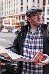 Hipster Young Man Looking The Map In A Urban Scene Stock Photo