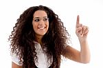 Hispanic Female Pointing Upwards Stock Photo