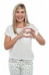 I Am In Love. Girl Making Heart With Fingers Stock Photo