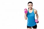 I Am Workout With Dumbbells Regularly Stock Photo