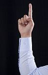 Index Finger Raised Stock Photo