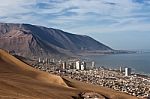 Iquique Behind A Huge Dune, Northern Chile Stock Photo