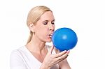 It's Hard Blowing A Balloon Stock Photo