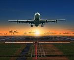 Jet Plane Taking Off From Airport Runway For Traveling And Logistic Theme Stock Photo