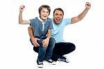 Joyous Father And Son Cheering Loud Stock Photo