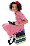 Joyous Pretty School Kid With Tablet Pc Stock Photo