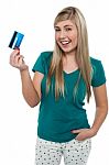 Joyous Teenager Displaying Credit Card Stock Photo