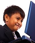 Kid Browsing The Internet Stock Photo