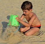 Kid On The Beach Stock Photo