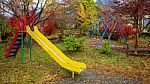 Kid Outdoor Playground With Autumn Color Stock Photo