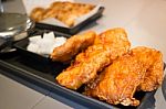 Korean Fried Chicken On Black Plate Stock Photo