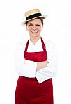 Lady Chef Standing With Crossed Arm Stock Photo