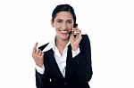 Lady Customer Support Executive On Call Stock Photo