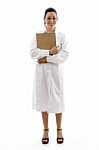 Lady Doctor standing With clipboard Stock Photo