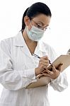 lady Doctor writing Prescription Stock Photo