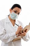 lady Doctor writing Prescription Stock Photo