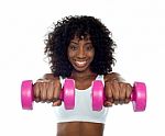 Lady Doing Dumbbell Exercise Stock Photo