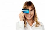 Lady Hiding His Eye With Credit Card Stock Photo