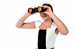 Lady Looking Through The Binocular Stock Photo