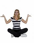 Lady Performing Yoga Sitting In Lotus Pose Stock Photo