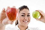 Lady Showing Green And Red Apples Stock Photo