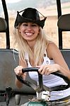 Lady Wearing Cowboy Hat Riding Quad Stock Photo