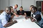 Language Training For Refugees In A German Camp Stock Photo