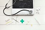 Laptop Computer And Retro Medical Instruments Stock Photo