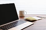 Laptop On Office Desk Stock Photo