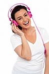 Laughing Woman Enjoying Music Stock Photo