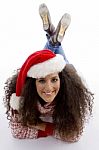 Laying Female Wearing Christmas Hat Stock Photo