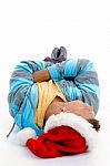 Laying Man With Christmas Hat Stock Photo