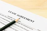 Lease Agreement Contract Document And Pencil Bottom Left Corner Stock Photo