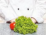 Lettuce And Tomato In Front Of The Chefs Stock Photo