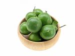 Lime In Wood Bowl With White Isolate Stock Photo