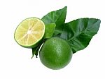 Lime With Slice And Leaf Isolate On White Background Stock Photo