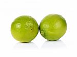 Limes On White Background Stock Photo