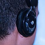 Listening Music On Headphone Stock Photo