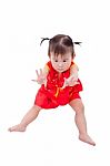 Little Asian Girl (thai) In Traditional Chinese Cheongsam Stock Photo