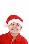 Little Boy In Santa Hat Stock Photo