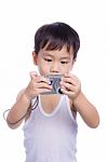 Little Boy  Interesting Digital Compact Photo Camera Stock Photo