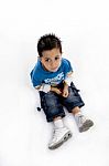 Little Boy Sitting Stock Photo