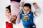 Little Children Lying Stock Photo