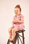 Little Girl Fashion Model In Rose Dress Stock Photo