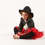 Little Girl Fashion Model With Black Hat Stock Photo