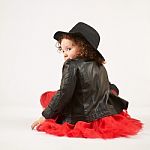 Little Girl Fashion Model With Black Hat Stock Photo