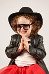 Little Girl Fashion Model With Black Hat Stock Photo