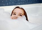 Little Girl In Bath Stock Photo